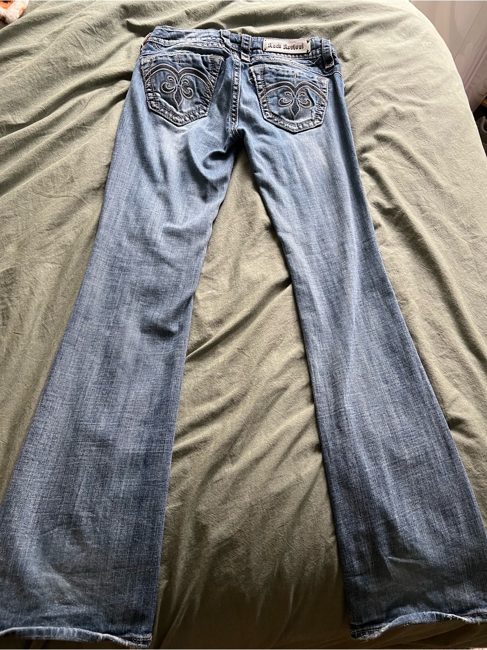 Rock Revival Light Blue Boot Cut Jeans with Subtle Distress